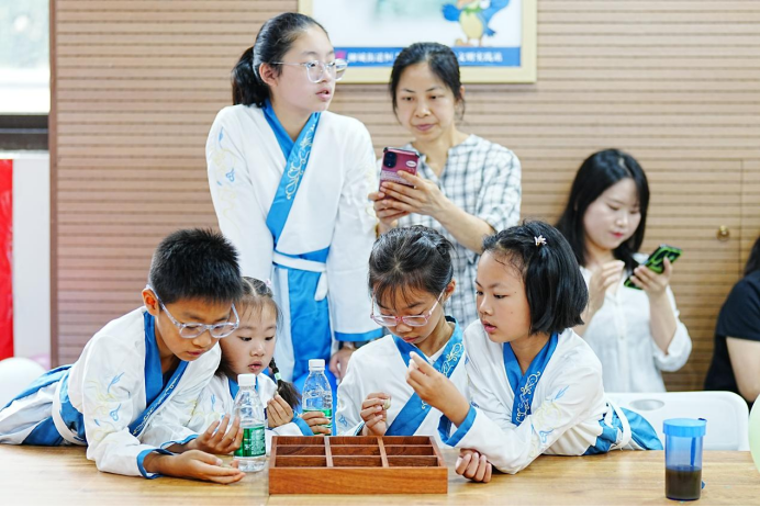 柳城53期恒大城社区小小中医师体验营1138.png